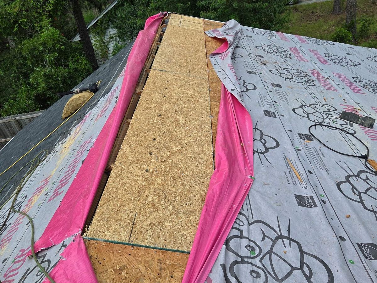 New decking installed along the ridge before ridge vent